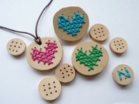 100procentheppie Cross Stitched Wooden Disks